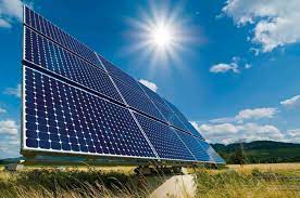 "Sunlight hitting solar panels, generating clean and renewable energy."